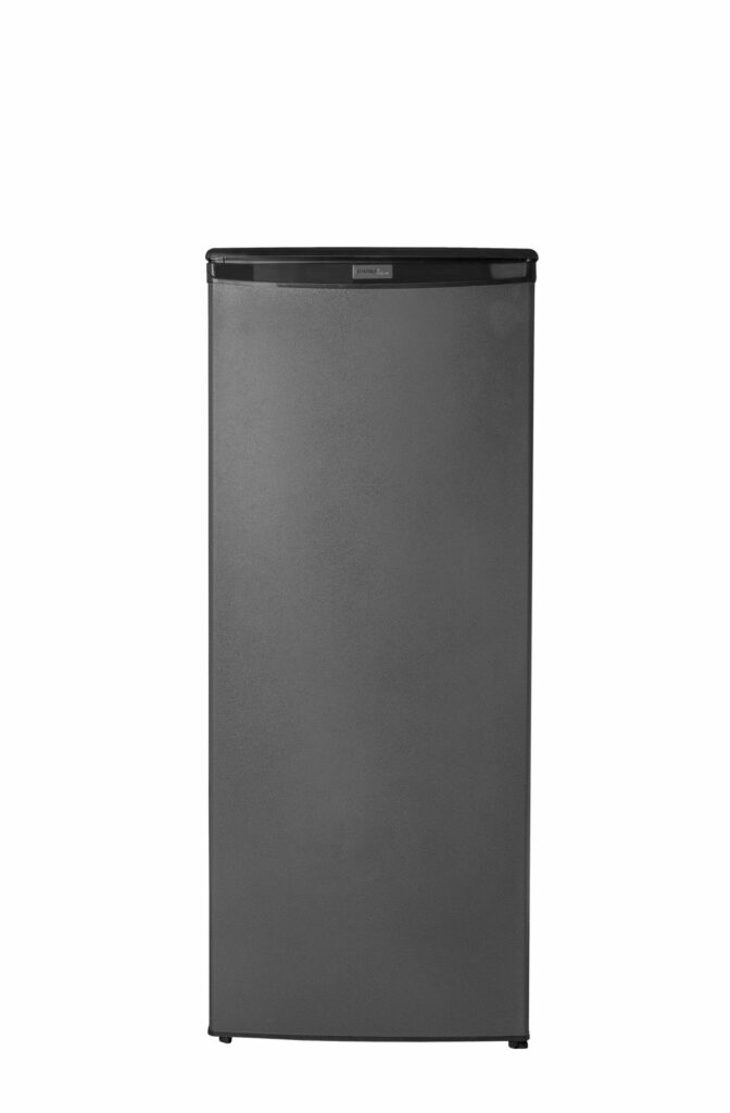 24 Inch All Freezer  Garage ready 8.5 cu. ft. Upright Freezer in Graphite. 60 inch tall. Stock up on your family’s frozen favorites with a Danby Designer graphite upright freezer, ideal for a basement, kitchen, or garage. Save on money and energy with this ENERGY STAR rated product which is great for saving floor space with its upright design. In addition, this unit features an abundance of space for food organization with four storage shelves and four-door shelves for smaller items. This model is garage ready and can perform in temperatures from 0°F to 110°F (-17°C to 43°C). Boasting 8.5 cu. ft. (241 L) of freezer space for frozen meals, meats, vegetables, and more, making it perfect for couples and small families. The convenient manual-defrosting function makes it easy to maintain and stay ice-free, and it also features an internal drip tray. The ultra-modern mechanical thermostat is a breeze to program and monitor, while the scratch-resistant worktop is ideal for storing extra accessories. This modern appliance also features a clever, reversible door hinge that enables you to adjust it for a left or right-handed opening. Included is an industry-leading 5-year warranty on parts and labor with in-home service