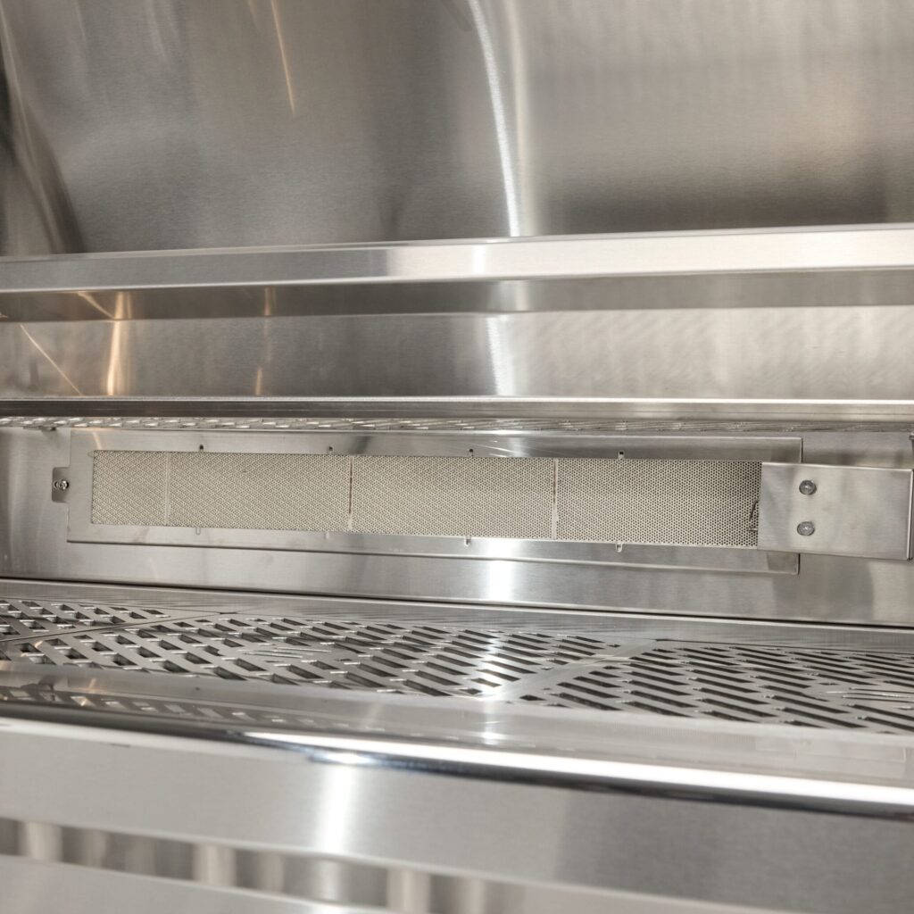 42 Inch Outdoor Grill Natural Gas Infinity Burners 955 square inches of cooking area Up to 110,000 BTU of output. Equipped with 4 Coyote Infinity Burners and 1 Infrared Burner, you’ll access a powerhouse of cooking potential with a massive 115,000 BTU output. This grill features complete 304 stainless steel construction and 990 square inches of cooking area. This unit will also include black briquettes and premium laser cut grill grates.